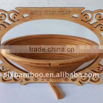 Foldable carved bamboo fruit basket