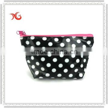 Laminated canvas cosmetic bag with white dots