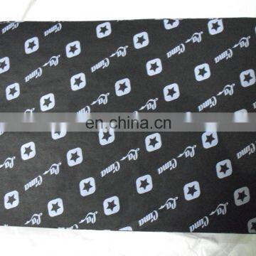 Black tissue paper with white logo