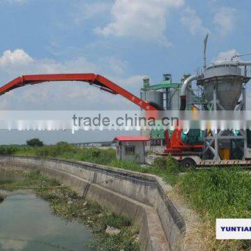 Pneumatic bulk material ship unloader