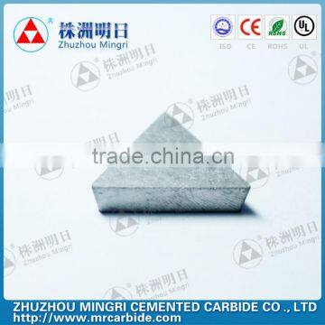 Tungsten carbide welding inserts for processing cast steel