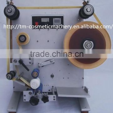 TENG MENG semi-automatic round bottle labeling machine