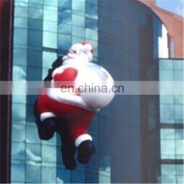 Outdoor Christmas Inflatable Santa Claus hanging on the wall for Christmas Deciration