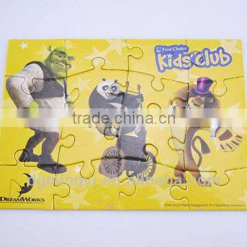 Children playing puzzle, paper puzzle card