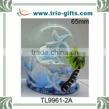 polyresin sea star and shell 65mm water globe blue pearlized finished