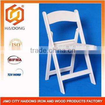 High quality white padded resin folding chair                        
                                                Quality Choice