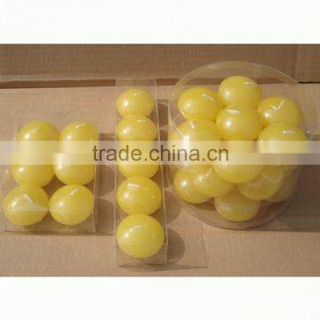 yellow water floating candle