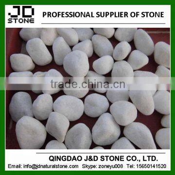 white pebble stone landscaping