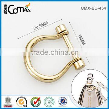 Metal gold center bar bag buckle design