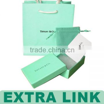 green packaging paper bag and packaging box with