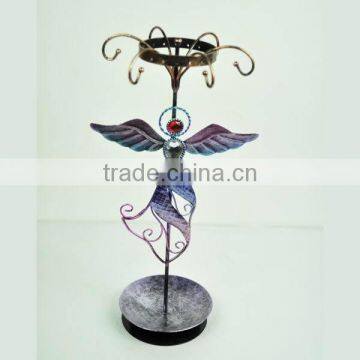 Glass jewellery display with butterfly