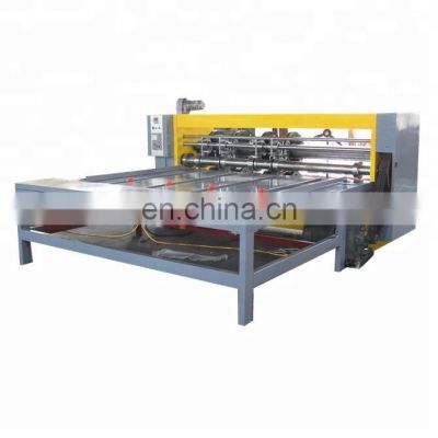 corrugated carton creasing and slotter machine