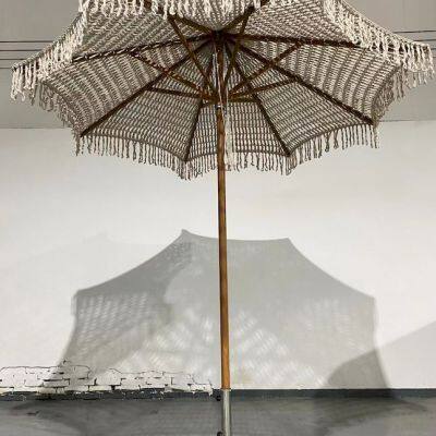 Manufacturers customize flower beach umbrellas, braided rope parasols, hollow umbrellas, center column parasols