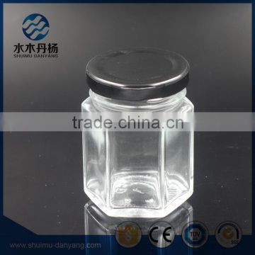 100ml hexagonal food grade glass jars glass storage bottle with black cap                        
                                                                                Supplier's Choice