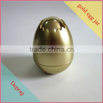 1oz gold egg shaped body cream plastic jar