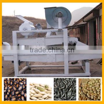 Automatic edible seeds de-hulling machine