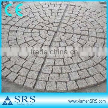 Beige granite paving stone mosaic