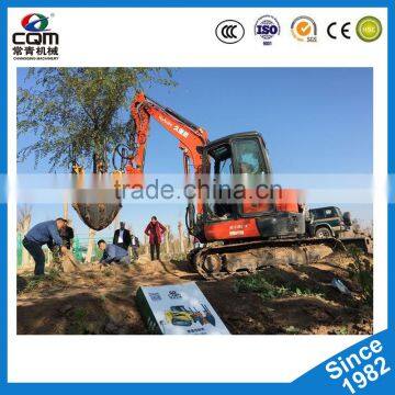 Moving tree with soil/ garden spade machine for crawler skid steer loade