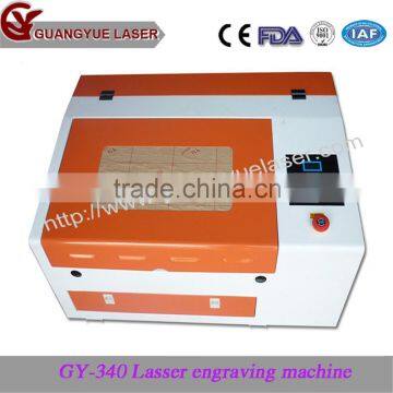 Mini laser engraving machine, CO2 laser cutting machine FOR sale GY-340