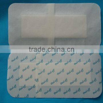 adhesive nonwoven wound dressing pad