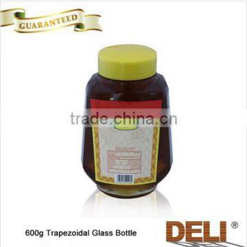 Pure raw comb honey in 453g glass bottle