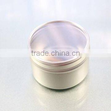 round tin box with window