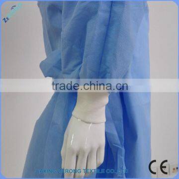China Supplier High Reinforced Disposable Impervious Surgical Gown in SMMS Fabric photo-4