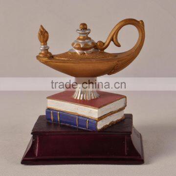 Arabia lamp and books polyresin sculpture