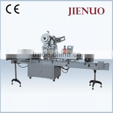 Automatic horizontal jar labeling machine