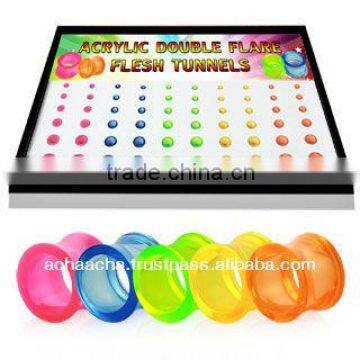 Display box with 70 pcs. of semi transparent acrylic double flare flesh tunnel