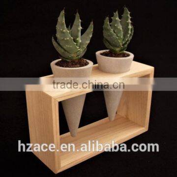 Concrete mini planters in wooden frame