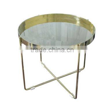 Golden stainless steel round coffee table