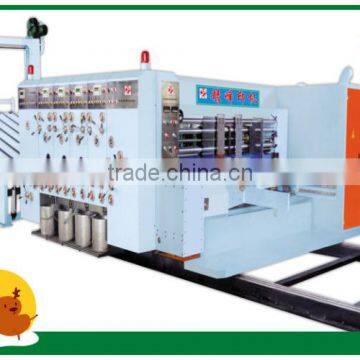 Automatic corrugated paperboard printing and slotting machine with high speed