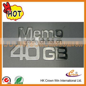 Embossed aluminum logo label with adhesive on back