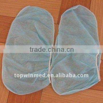 Nonwoven shoe cover