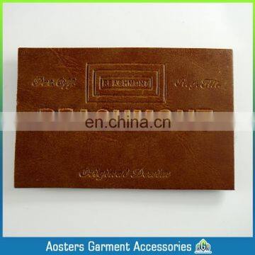 custom OEM fashion metal jeans leather labels made in china