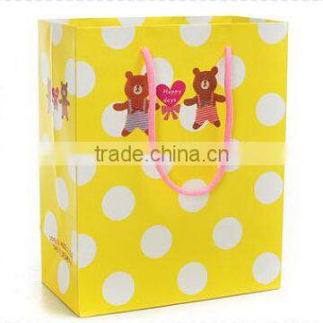 bright yellow attractive printed gift paper bag