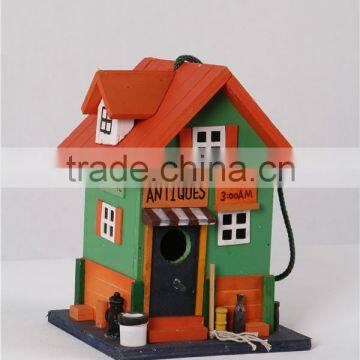 New wooden colored birdhouse for decoration birdnest