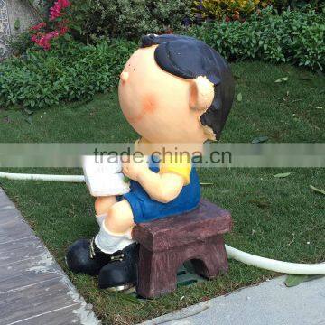 FRP student figurine in garden