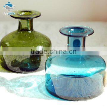 Fine design indoor decoration exposure colorful glass bottle flower vase