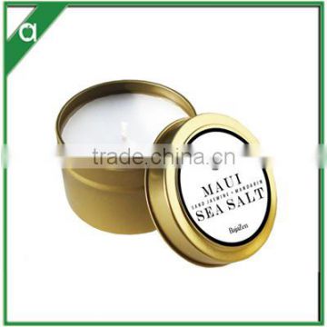 small luxury travel scented candle in gold tone tin