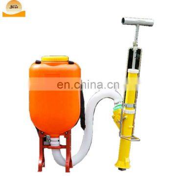 Pedal backpack fertilizer dispenser spreader machine