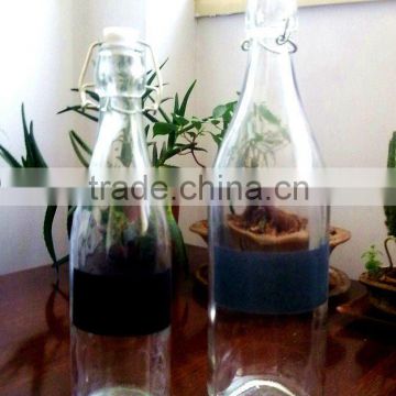 big glass bottle with plastic lid