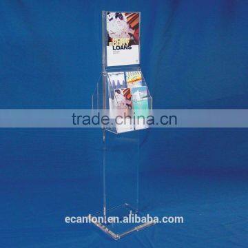 Free standing acrylic brochure holder on floor