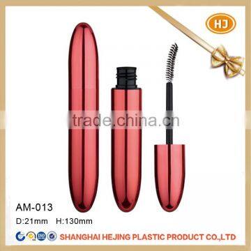 Empty metal mascara tube with brush for cosmetic use