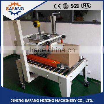 FXJ-6050 Top & Bottom Drive Automatic Strapping Machine photo-2