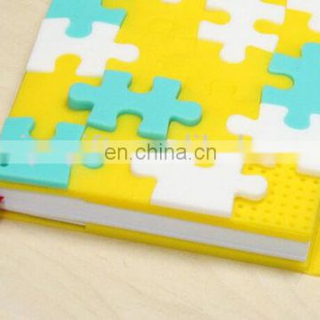 Customize design Waterproof A6 size notebook with silicone puzzle surface book cover