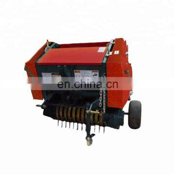 Tractor mounted mini round hay baler