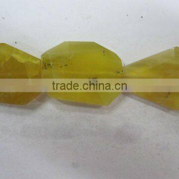 Wholes faceted yellow opal