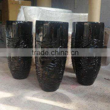 Modern black fiberglass pot